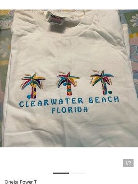 Women’s White Clearwater Beach Florida shirt & blue shorts.  Size Medium